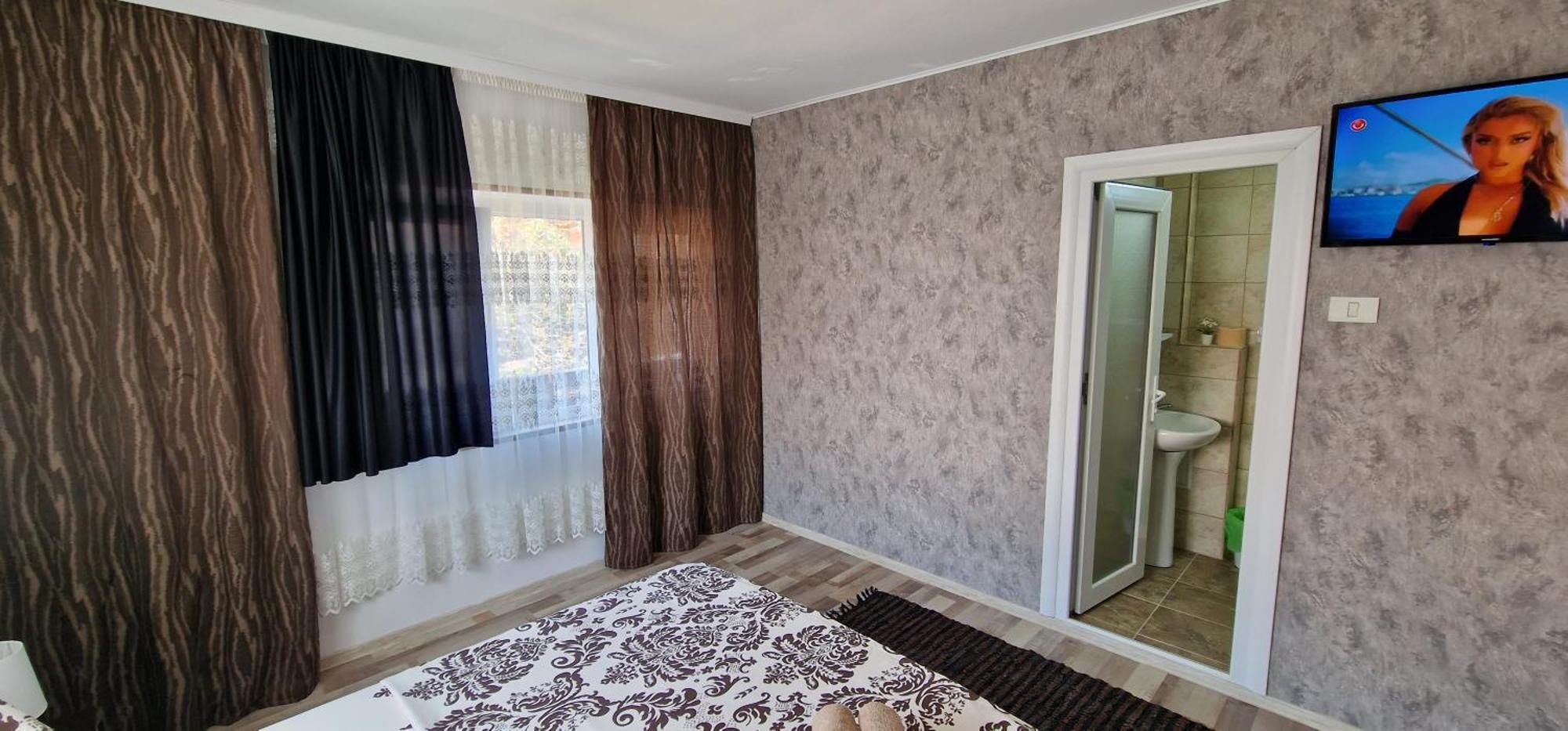 Отель Casa Sebastian Костинешти Номер фото